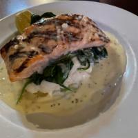 Grilled Salmon in a Lemon Butter Sauce  · Filet of Salmon Grilled Topped with a Lemon Butter Sauce & Served on a Bed of Spinach & Mash...