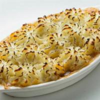 Shepherds Pie  · Fresh ground beef, peas, carrots and gravy topped with homemade mashed potatoes.