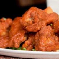 6 Buffalo Chicken Wings · 6 Pieces . Choice of Very Hot, Hot, Mild, BBQ, Plain, Parmesan Garlic, or Sweet Chili.  Serv...