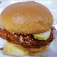 Sticky Chicken Sandwhich · Dipped in our famous house made sweet and spicy sauce.