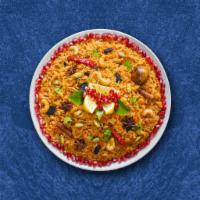 Veggie Bayside Biryani · Aromatic rice flavored with garden fresh vegetables, fragrant with saffron, garnished with r...