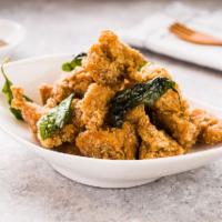 Popcorn Chicken · Bite sized, breaded, and fried chicken.