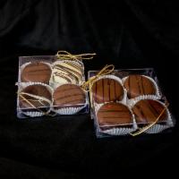 Chocolate Covered Oreos · Classic, chocolate covered oreos, with chocolate drizzles. What more do we need to say? Deli...