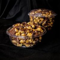 Turtle Corn · A fabulous combination of amazing caramel corn with pecans mixed in and a heavy drizzle of m...