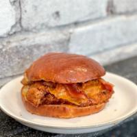 #5 The Favorite · Fried Chicken, Bacon, Cheddar, with Chipotle Mayo Served on a Brioche Bun