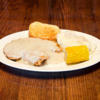 Chicken Fried Steak · Hand breaded and deep fried, topped with country gravy and 2 sides.