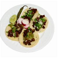 #4 - 4 Tacos · 
The famous street tacos! Corn tortillas with your choice of filling, including onions, and ...