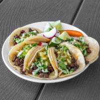 #5 - 5 Tacos  · 
The famous street tacos! Corn tortillas with your choice of filling, including onions, and ...