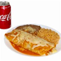 #6 - Burrito Plate · Flavorful red sauce smothered over a flour tortilla that is filled with beans and your desir...