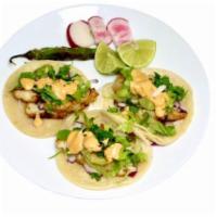 #11 - 3 Fish Tacos  · Delicious savory fish tacos on a corn tortilla, + cabbage, radish, serrano pepper, cilantro,...
