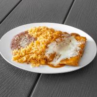 #16 - 2 Tamales Plate  · 2 tamales, choice of pork, chicken or cheese with mild poblano pepper, sauce, rice, beans, M...