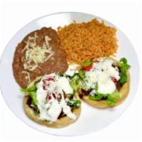 #17 - 2 Sopitos Plate  · 2 sopitos: masa, beans, choice of meat, lettuce, tomato, sour cream, cheese with rice and be...