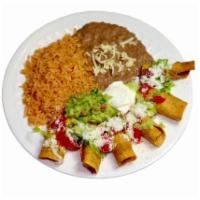#18 - 3 Taquitos Plate  · Corn tortilla, chicken, potato and cheese, lettuce, tomato, salsa, cheese, sour cream, and g...
