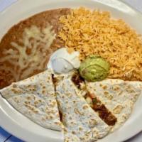 #21 - Meat Quesadilla Plate  · Flour Tortilla, Filled with your Choice of Meat, Cheese, Onion, and Cilantro. Served with Le...