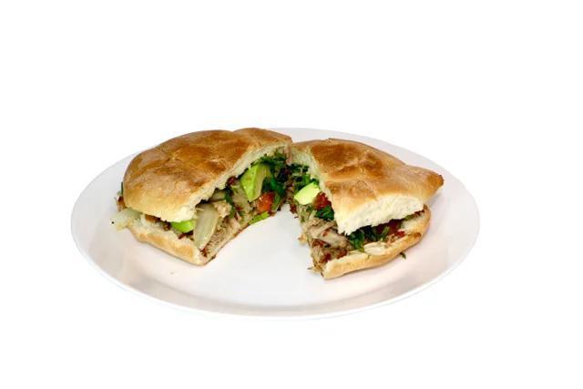 #22 - Torta  · Bread, Mayonnaise, Cheese, Choice of Meat, Lettuce, Tomatoes, Onions, Cilantro, Avocado, and a Serrano Pepper on the side.
