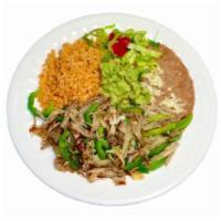 #25 - Pork Carnitas · Pork Carnitas served with Onions, Bell Peppers, Rice, Beans, Cheese, Lettuce, Tomatoes and G...