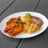 #29 - Pollo A La Plancha · Boneless chicken breast served with rice, beans, guacamole, serrano pepper and homemade corn...