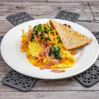 Omelet · Built your own omelet by choosing 4 items. Served with Home-style Potatoes and Toast