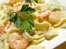 Shrimp Alfredo · Sautéed Shrimp, with home-style Alfredo sauce and tossed with Penne Pasta