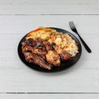 Jerk Chicken · We serve the best baked Jerked Chicken in the Bronx. A liberal serving with Walkers Wood Sty...