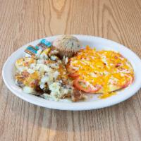 Western Omelet · Smoked bacon, green peppers, onions, tomatoes and a blend of Jack and cheddar cheeses.