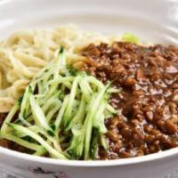 炸酱面 Noodle with Fried Soy Bean Sauce · Cooked in oil.