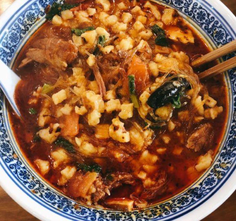酸辣小炒泡馍 Spicy and Sour  Soup with Pancake · Soup that is both spicy and sour, typically flavored with hot pepper and vinegar.