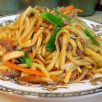 炒手工拉面 Fried Streched Hand Made Noodle · Cooked in oil.