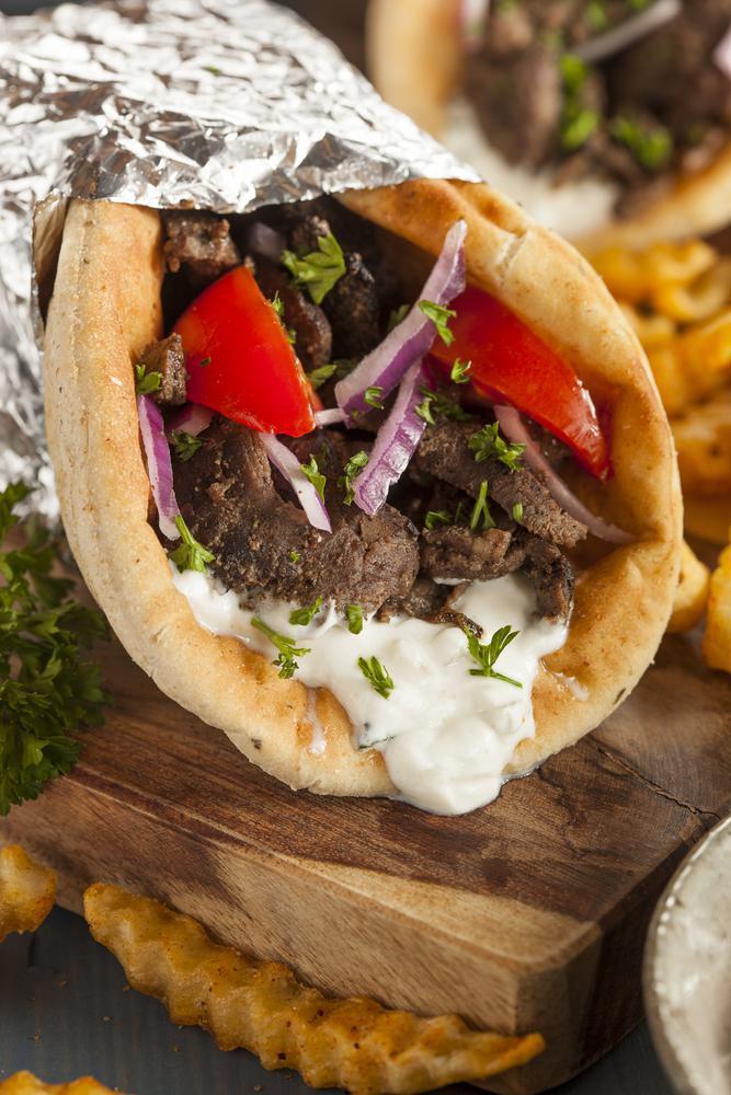 Lamb Gyro Sandwich · Cooked on a spit and wrapped in a pita. 