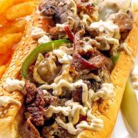 Philly cheese steak · Steak, cheese, and caramelized onion sandwich. 