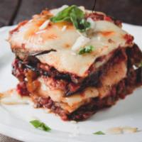 Parmigiana Napoletana  · Neapolitan style eggplant Parmigiana. 