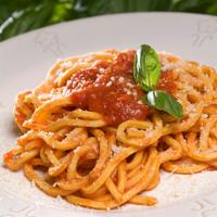 Spaghetti alla Chitarra · Fresh homemade spaghetti with fresh tomato sauce and basil. 