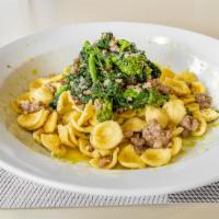 Orecchiette alla Barese · Little ear shape pasta with broccoli rabe, sweet Italian sausage and provola affumicata. 