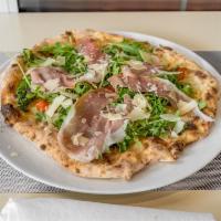 Mattozzi  · White pizza. Mozzarella topped with arugula, cherry tomatoes, shaved Parmesan cheese and Par...