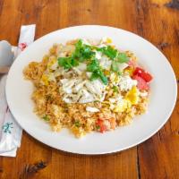 6. Carb Fried Rice · Stir-fried jasmine rice with crab meat, eggs, onions and tomatoes.