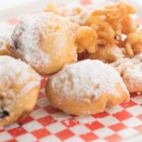 Assorted Sweet Box · Sampler box of 3 Fried oreos, 1 mini funnel cake, & 1 churro stick mixed in one box with pow...