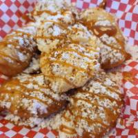 Deep Fried Apples · 5 slices of battered apples deep fried to a golden crunch served with powdered sugar. Taste ...