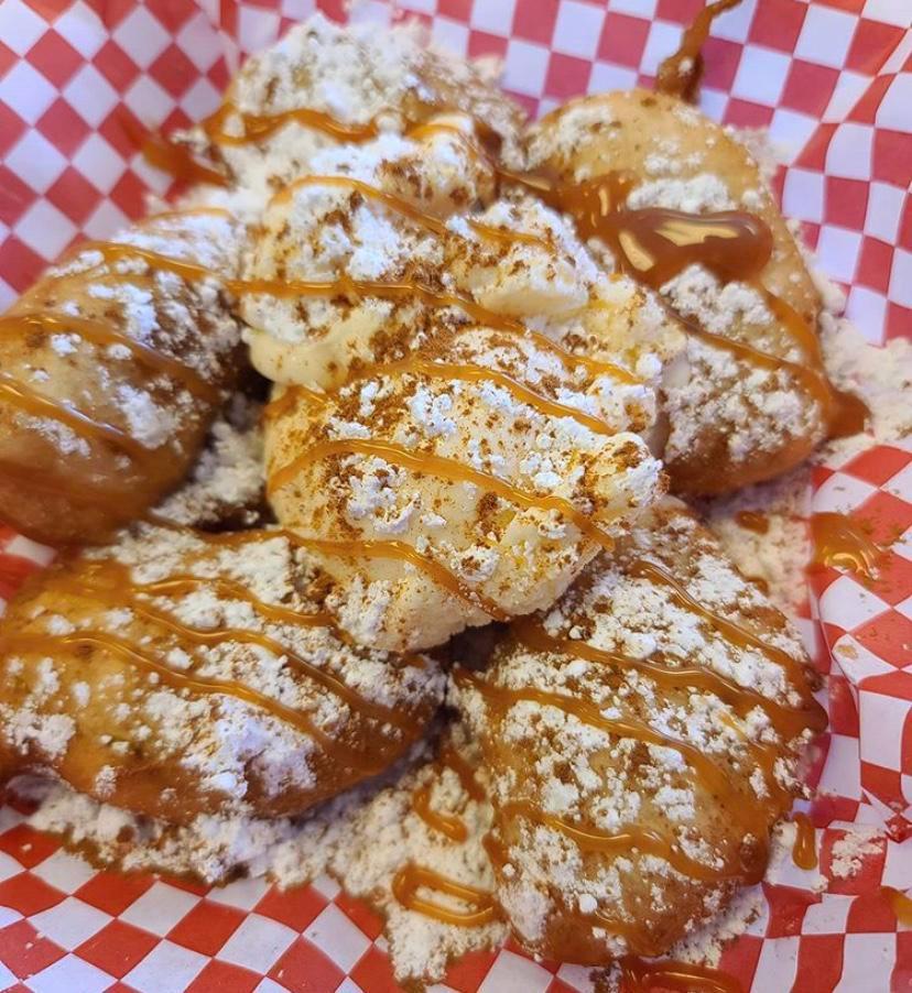 Deep Fried Apples · 5 slices of battered apples deep fried to a golden crunch served with powdered sugar. Taste of a hot apple pie