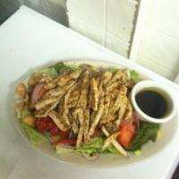 Grilled Chicken Salad · Marinated chicken breast served over tossed salad.