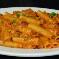 Rigatoni Bolognese · w/ heavy cream & meat sauce