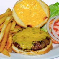 Cheese Burger Deluxe · served w/ French fries lettuce tomatoes and onions