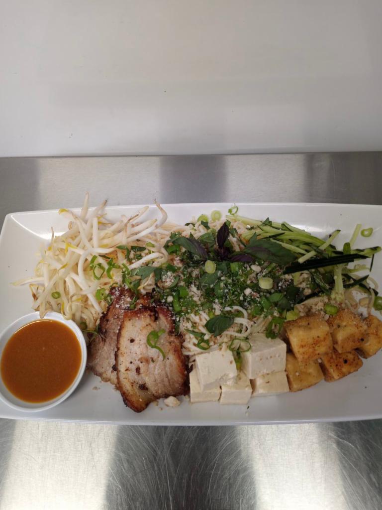 Vietnamese Cold Noodle Salad Special · Chilled thin rice noodles, bean sprouts, cucumber, Thai basil, peanuts, cilantro, scallion, and lime soy dressing. Add-ons for an additional charge.