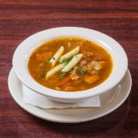 Vegan Minestrone Soup · Fresh garden vegetables, cannellini beans and penne pasta, in a savory vegetable broth. Russ...