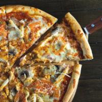 Pizza Villagio · Grilled chicken, portobello mushrooms, arugula, mozzarella, Kalamata olives, sun-dried tomat...