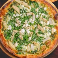 Pesto Chicken Pizza · Tender grilled chicken, feta cheese, spinach and mozzarella, with Russo’s pesto sauce.