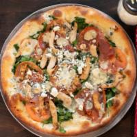Andrea's Specialty Pizza · Grilled chicken, Prosciutto di Parma, fresh spinach, Roma tomatoes, and Dolce Gorgonzola che...