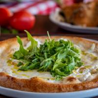 Truffle Burrata & Ricotta Pizza · Ricotta cheese sauce, Sicilian extra-virgin olive oil, arugula, fresh basil, and black truff...