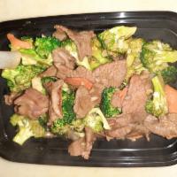 Beef with Broccoli · Beef tenderloin sauteed with fresh broccoli, carrots and sliced bamboo shoots in brown sauce.