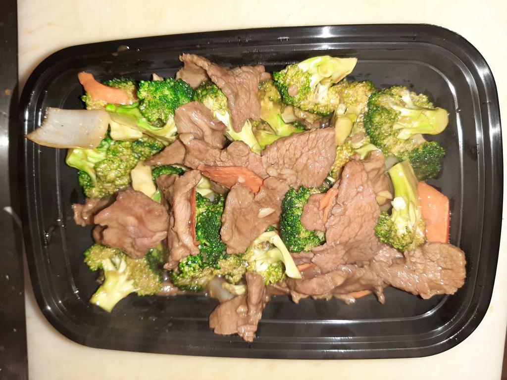 Beef with Broccoli · Beef tenderloin sauteed with fresh broccoli, carrots and sliced bamboo shoots in brown sauce.