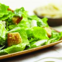 Classic Caesar Salad · Romaine lettuce, creamy Caesar dressing, Parmesan cheese and croutons.